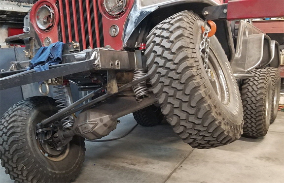 6 wheeled Jeep articulating.